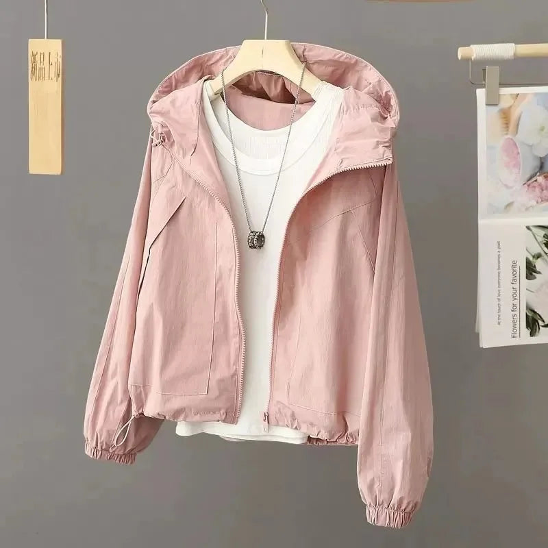 Sun-proof, lightweight, and stylish. This sheer, hooded jacket provides effortless sun protection and breathability.