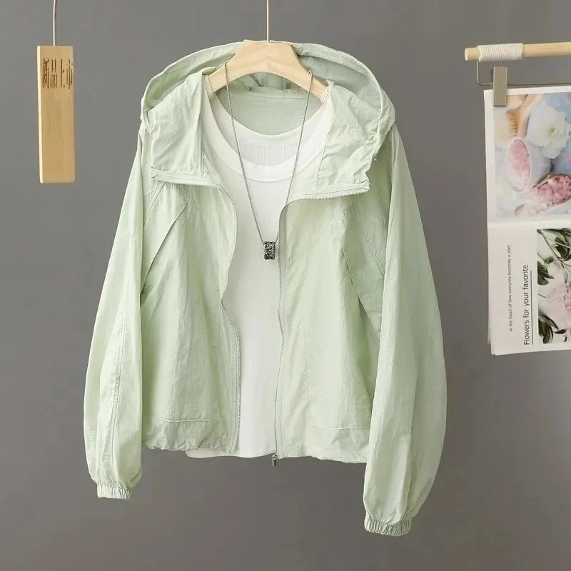 Sun-proof, lightweight, and stylish. This sheer, hooded jacket provides effortless sun protection and breathability.