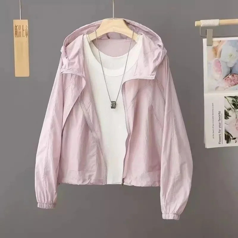 Sun-proof, lightweight, and stylish. This sheer, hooded jacket provides effortless sun protection and breathability.