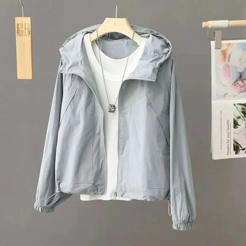 Sun-proof, lightweight, and stylish. This sheer, hooded jacket provides effortless sun protection and breathability.