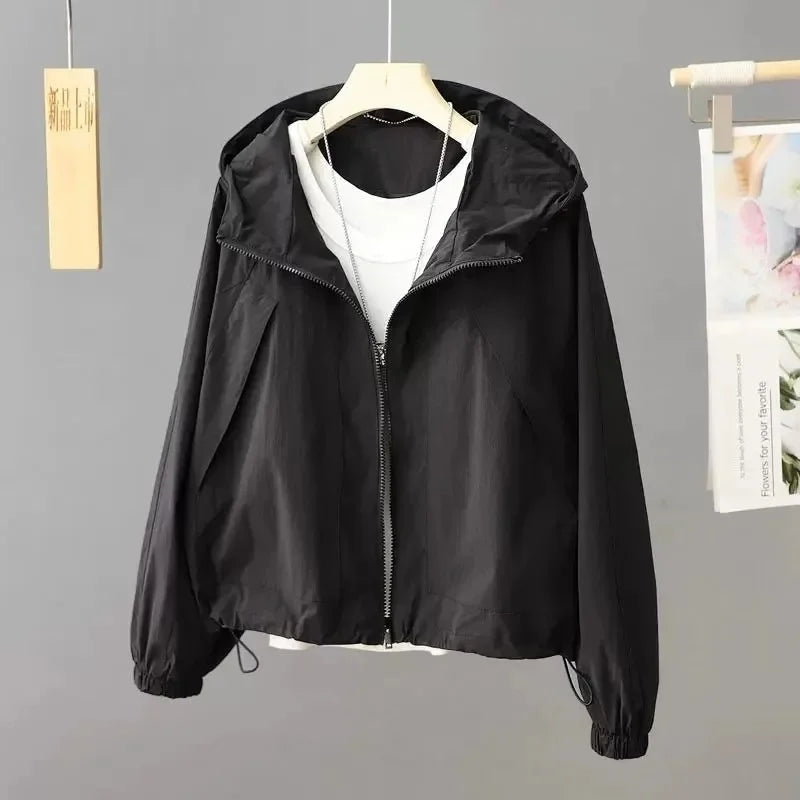Sun-proof, lightweight, and stylish. This sheer, hooded jacket provides effortless sun protection and breathability.
