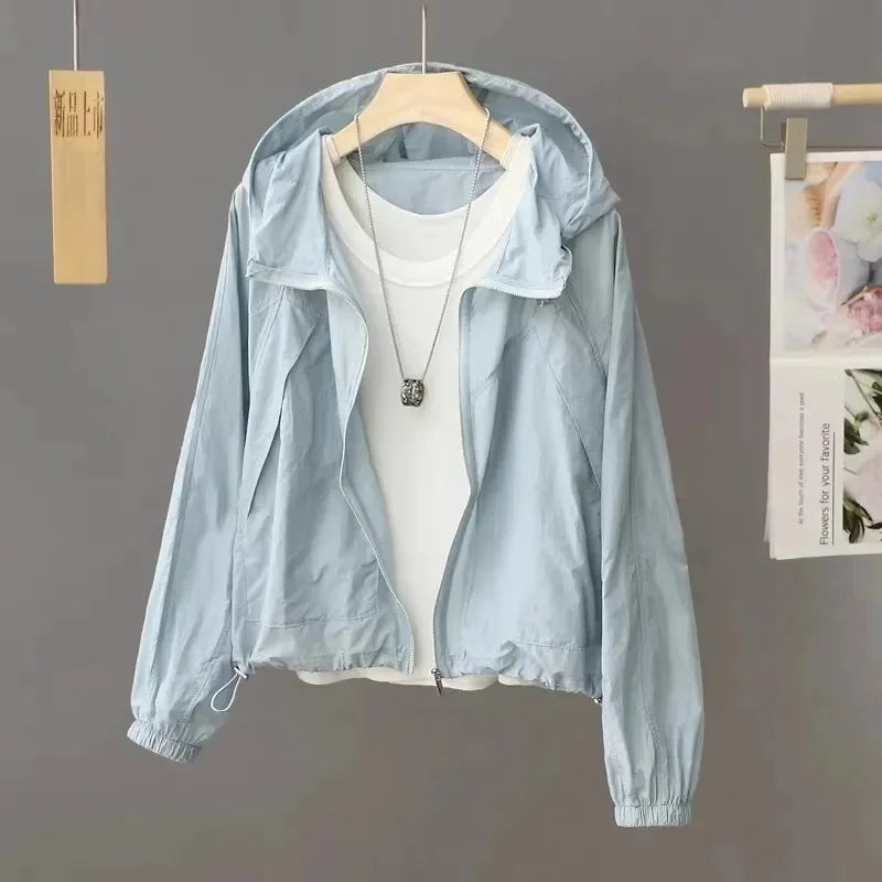 Sun-proof, lightweight, and stylish. This sheer, hooded jacket provides effortless sun protection and breathability.
