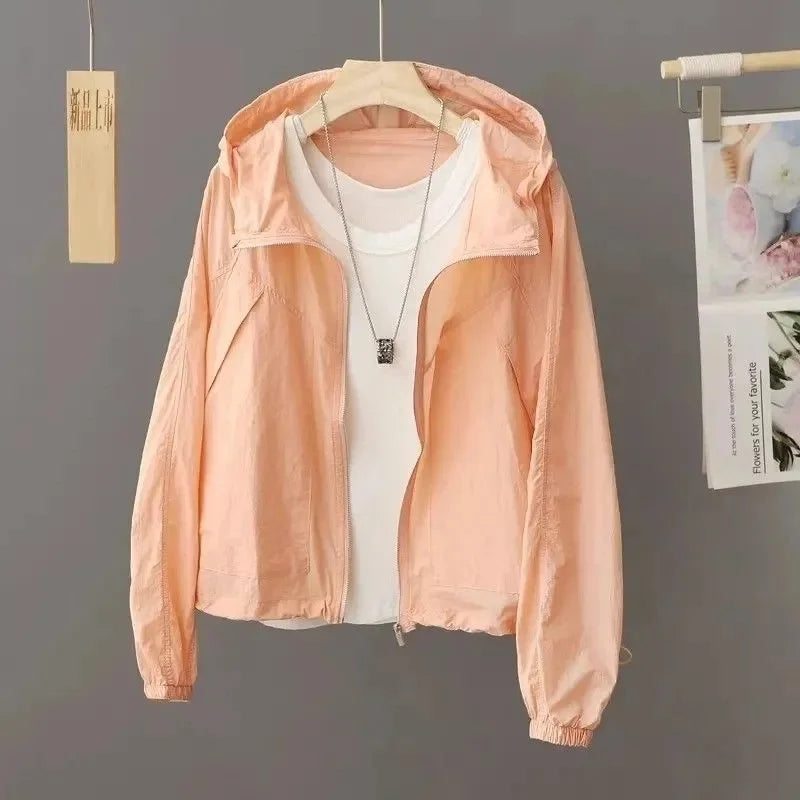 Sun-proof, lightweight, and stylish. This sheer, hooded jacket provides effortless sun protection and breathability.