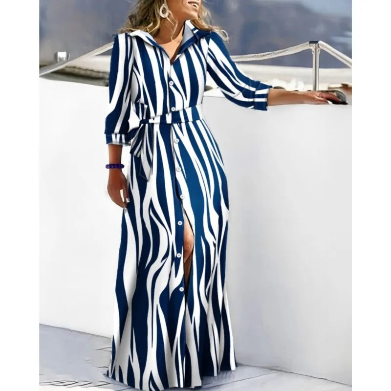 The dress that defines your spring. Elegant, flowy, and versatile, this maxi shirt dress with a waist tie enhances your silhouette with style. Perfect for any occasion, from casual to more sophisticated.